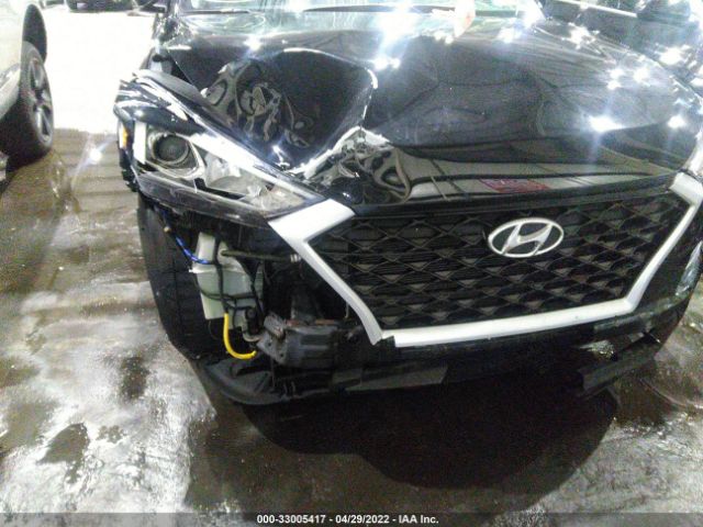 Photo 5 VIN: 008J2CA4XKU001021 - HYUNDAI TUCSON 