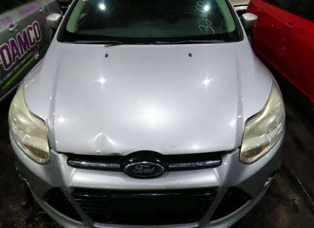 Photo 9 VIN: 00AHP3H20CL146395 - FORD FOCUS 