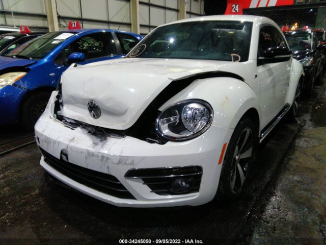 Photo 1 VIN: 00WVS7AT5EM600919 - VOLKSWAGEN BEETLE COUPE 