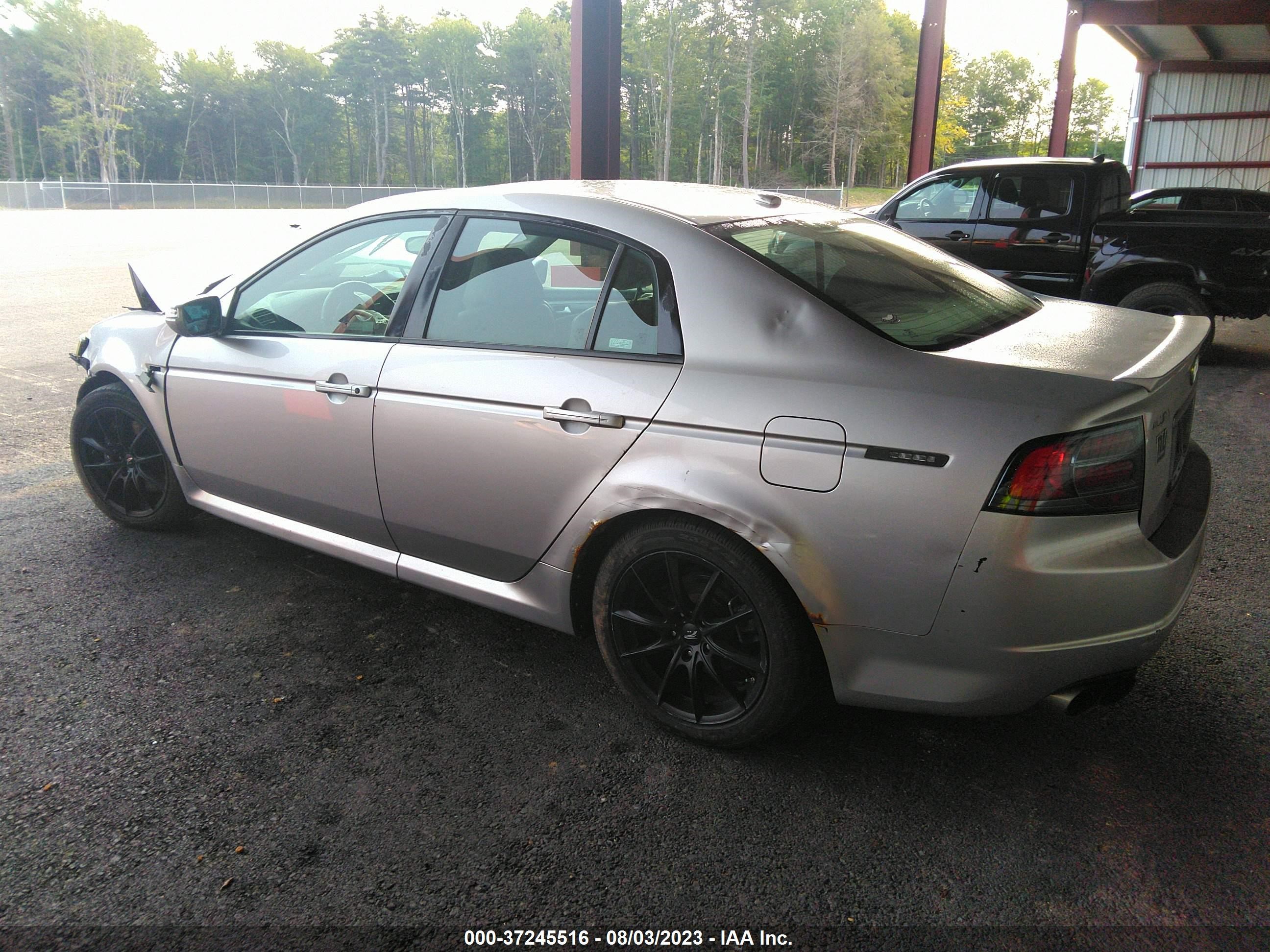 Photo 2 VIN: 19UUA76557A007199 - ACURA TL 