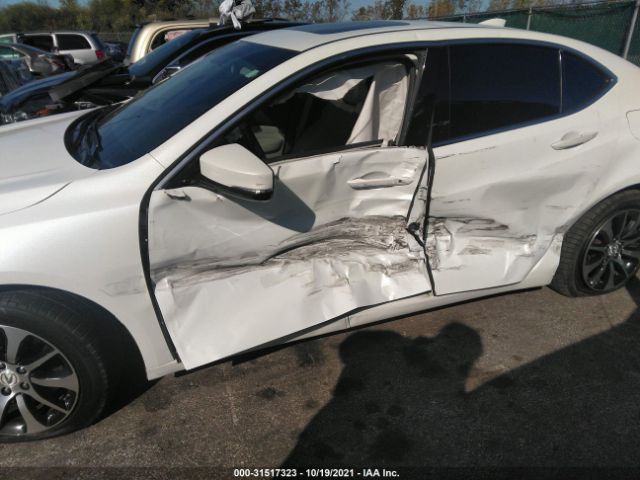 Photo 5 VIN: 19UUB1F30FA018635 - ACURA TLX 