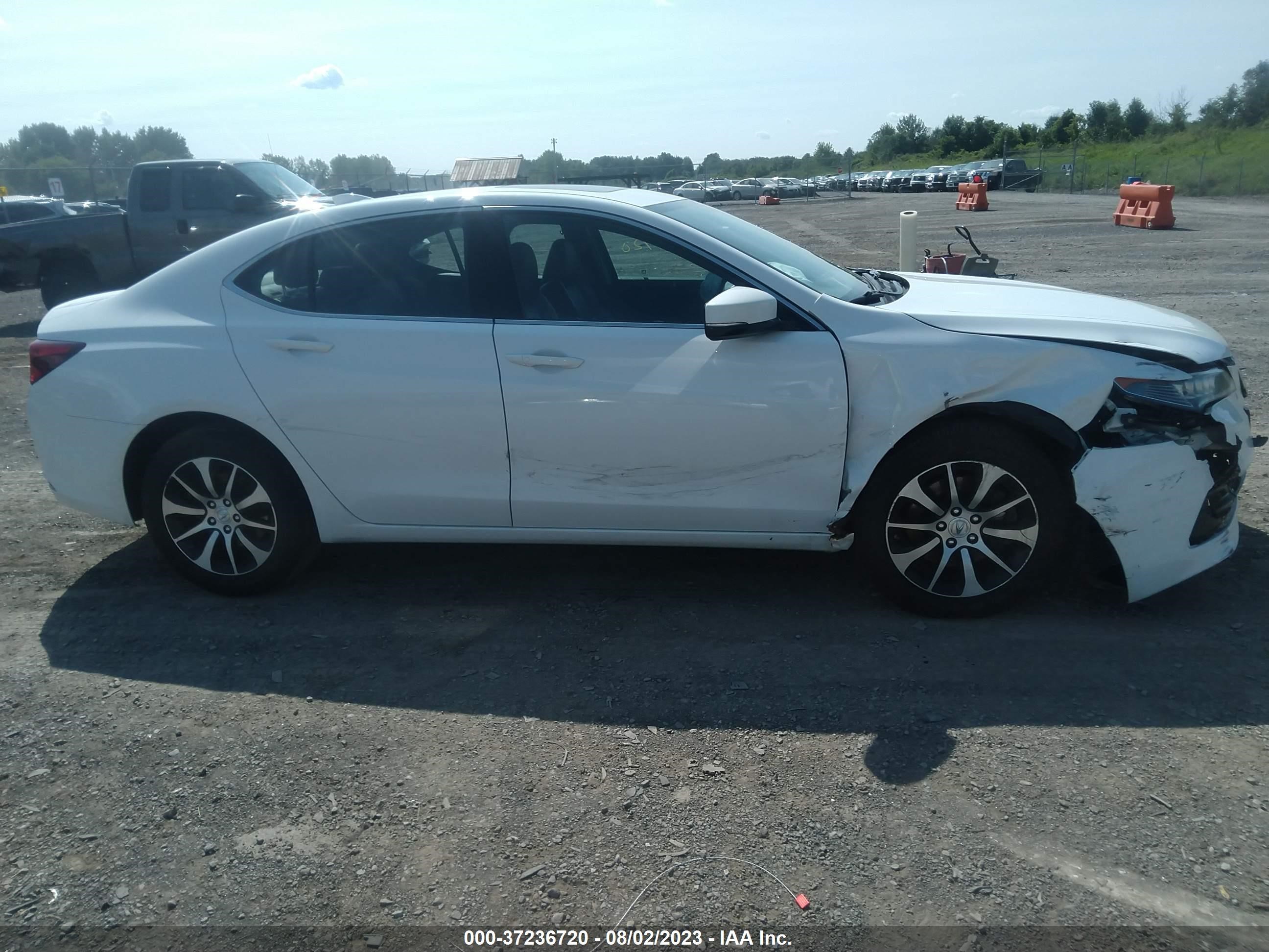 Photo 12 VIN: 19UUB1F37GA000098 - ACURA TLX 