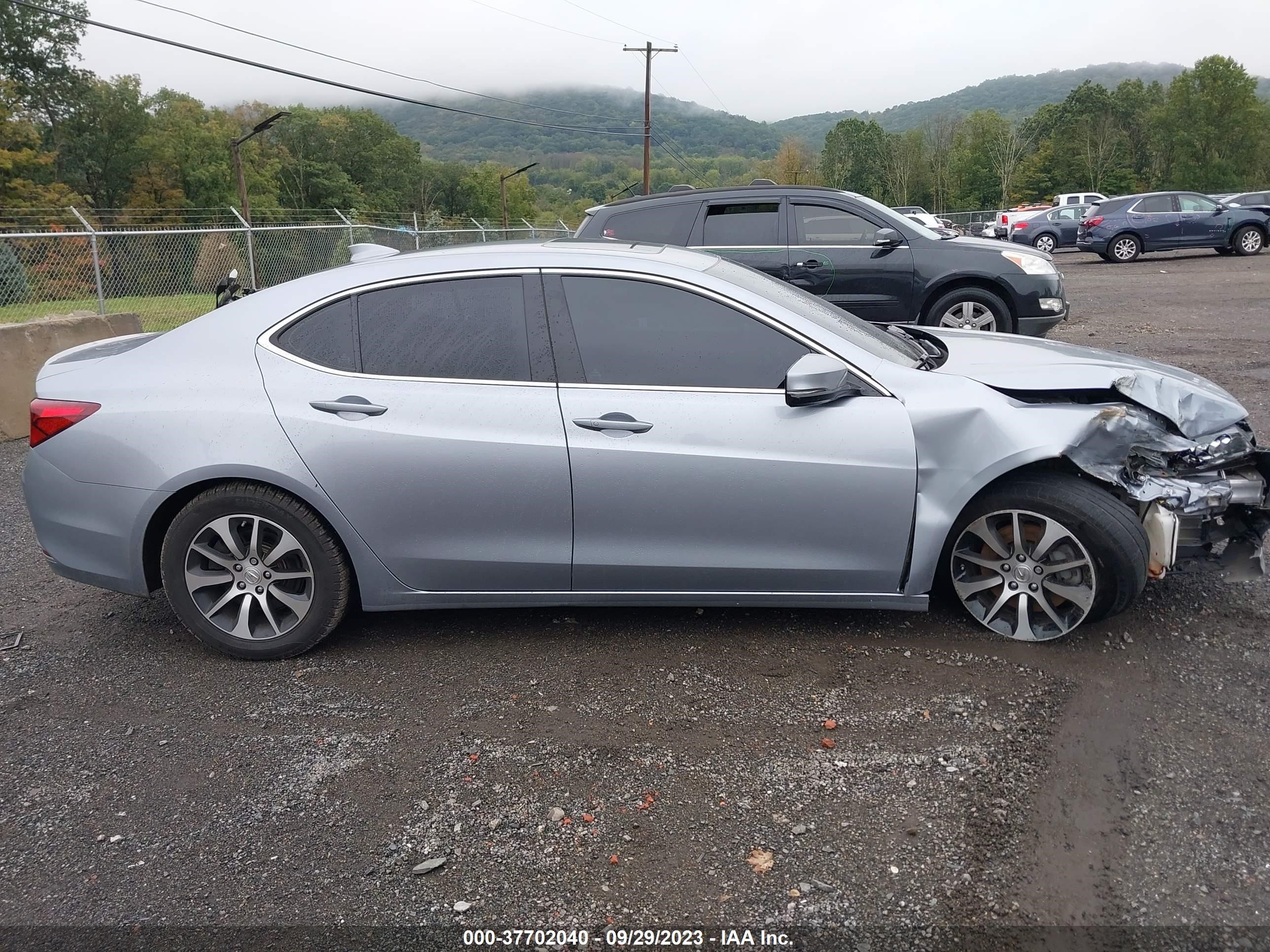 Photo 12 VIN: 19UUB1F50GA011834 - ACURA TLX 