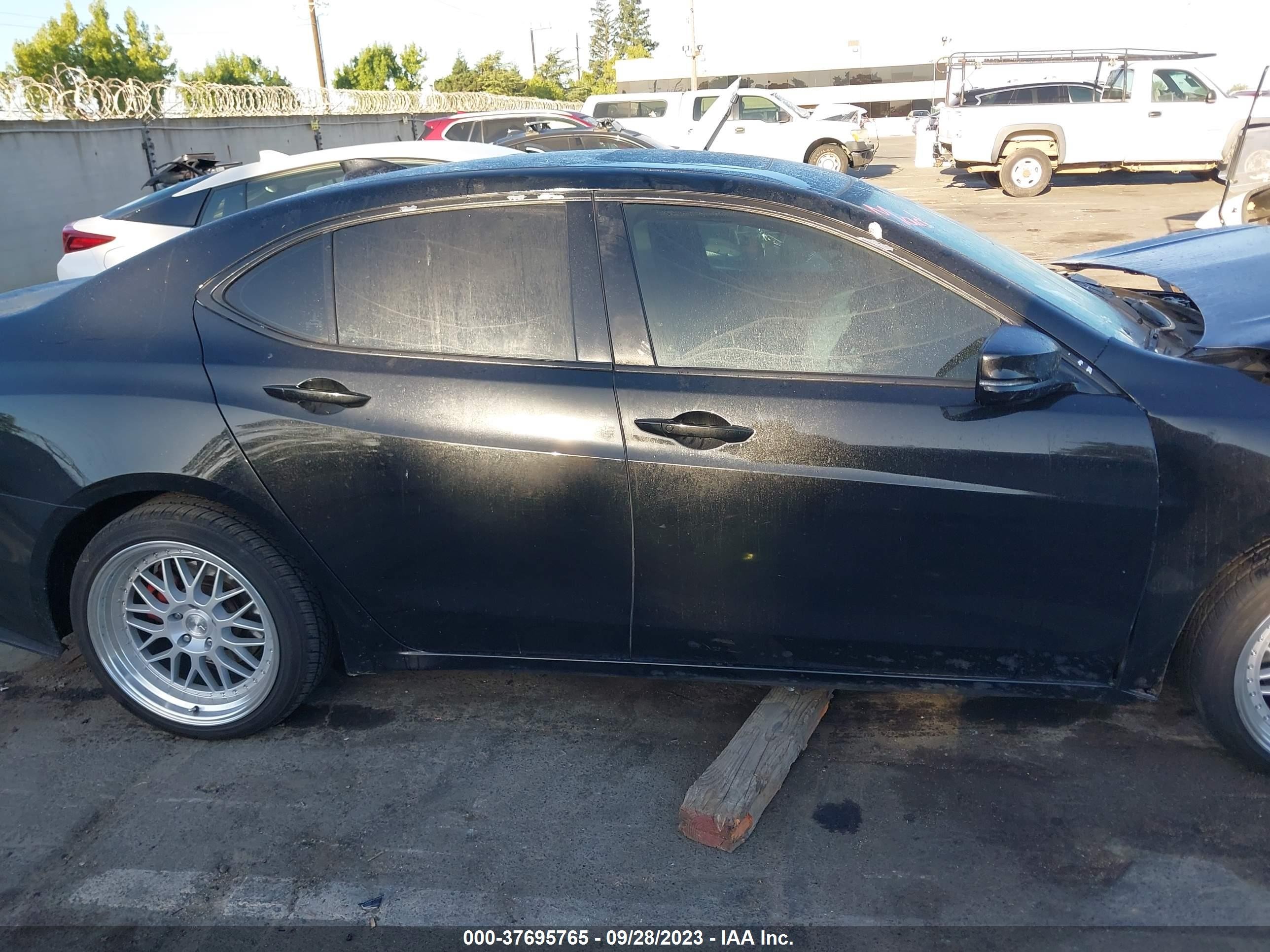 Photo 11 VIN: 19UUB1F54FA017571 - ACURA TLX 