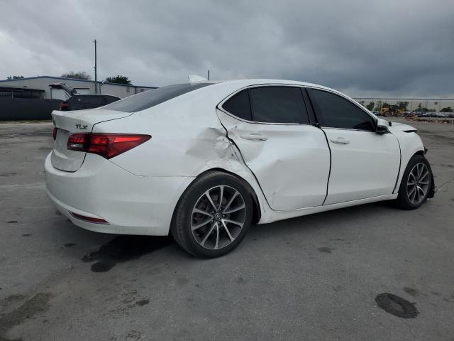 Photo 2 VIN: 19UUB2F32FA014351 - ACURA TLX 