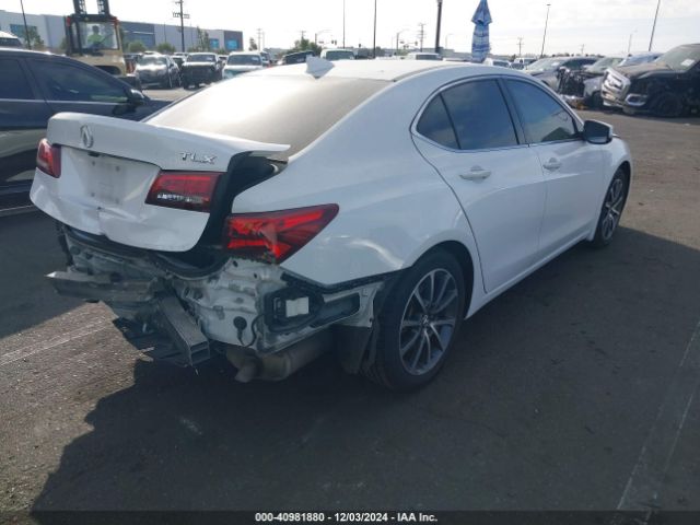 Photo 3 VIN: 19UUB2F59FA023341 - ACURA TLX 