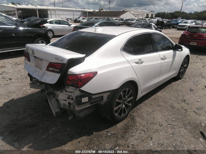 Photo 3 VIN: 19UUB2F59GA011238 - ACURA TLX 