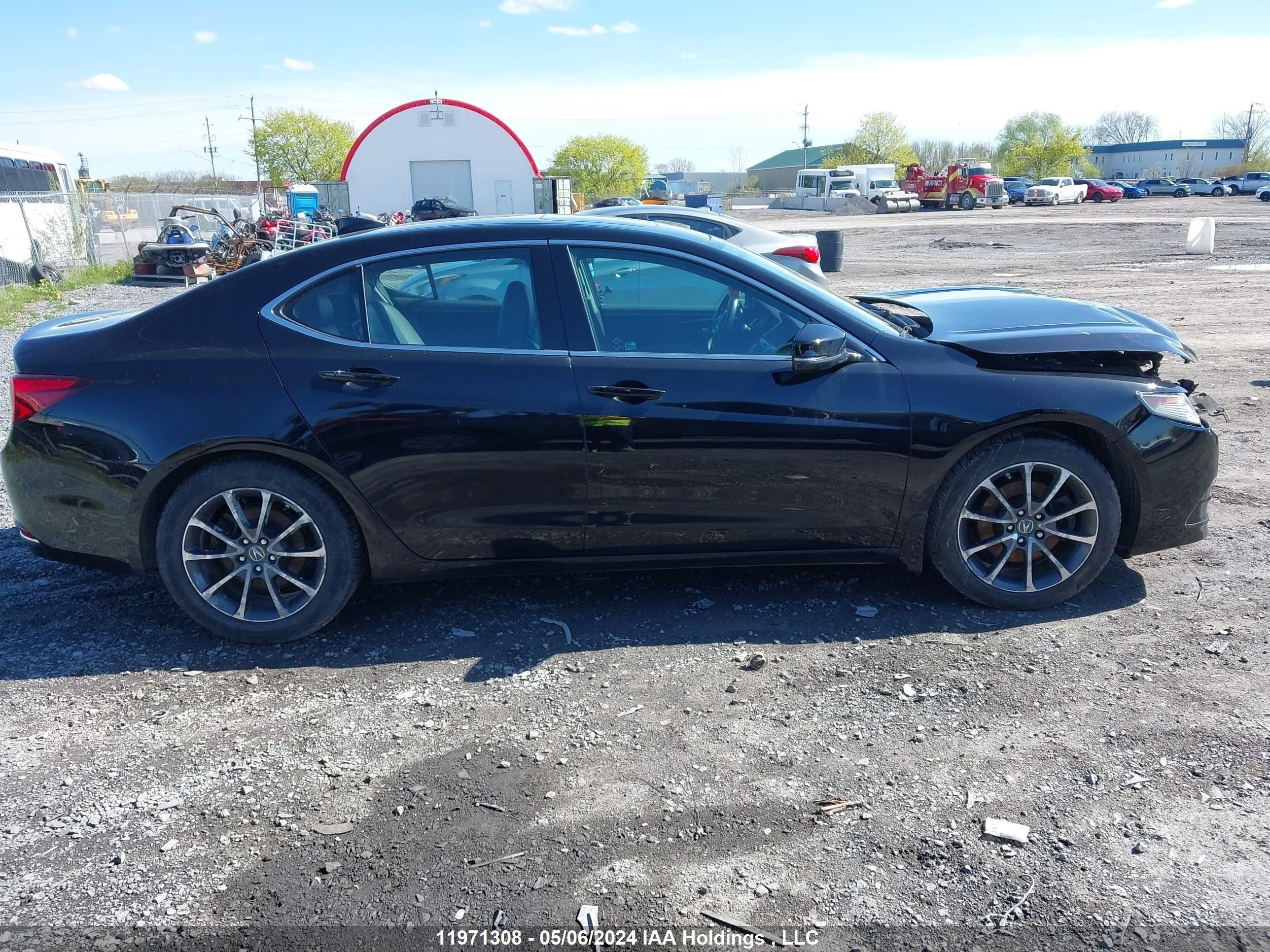 Photo 12 VIN: 19UUB3F31GA800570 - ACURA TLX 