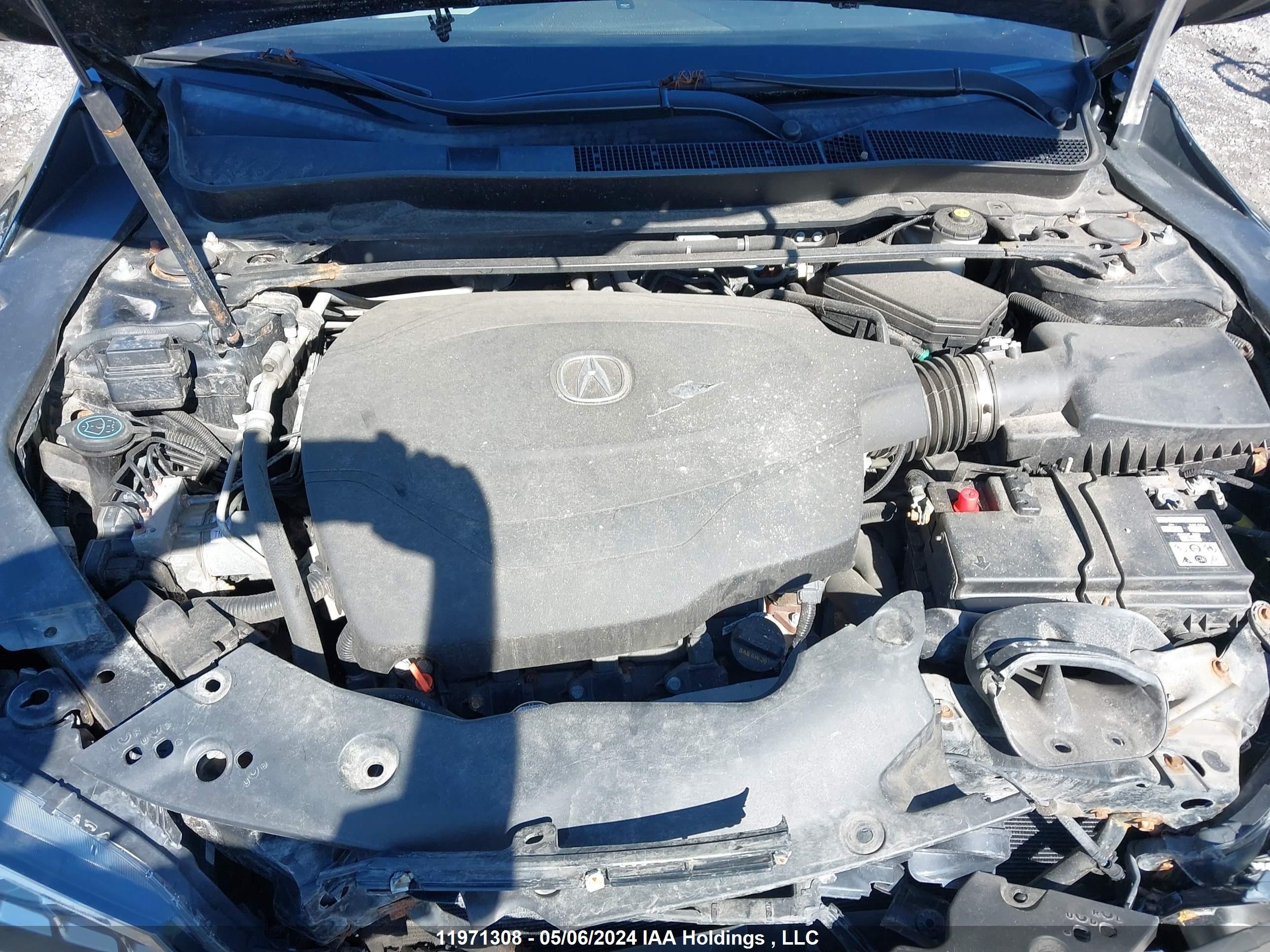 Photo 9 VIN: 19UUB3F31GA800570 - ACURA TLX 