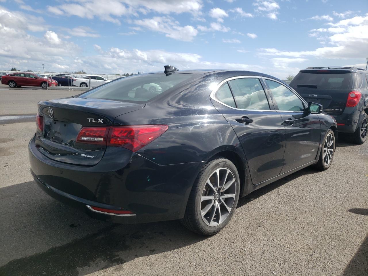 Photo 2 VIN: 19UUB3F71FA003401 - ACURA TLX 