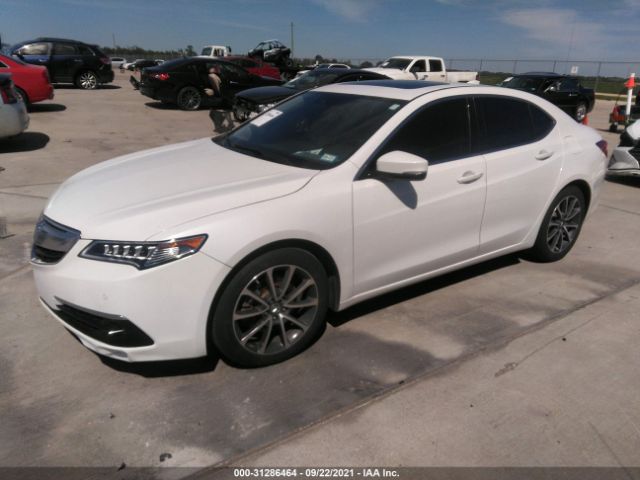 Photo 1 VIN: 19UUB3F75FA010108 - ACURA TLX 