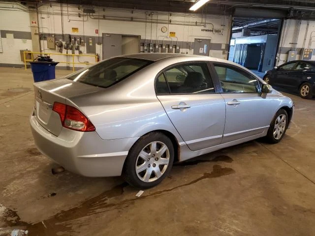 Photo 2 VIN: 19XFA16529E007214 - HONDA CIVIC LX 