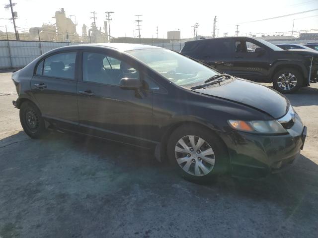 Photo 3 VIN: 19XFA1E54AE022982 - HONDA CIVIC LX 