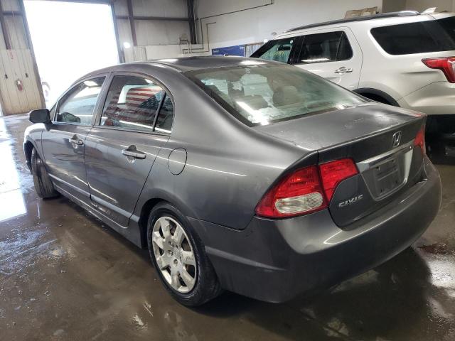 Photo 1 VIN: 19XFA1F50AE046470 - HONDA CIVIC LX 