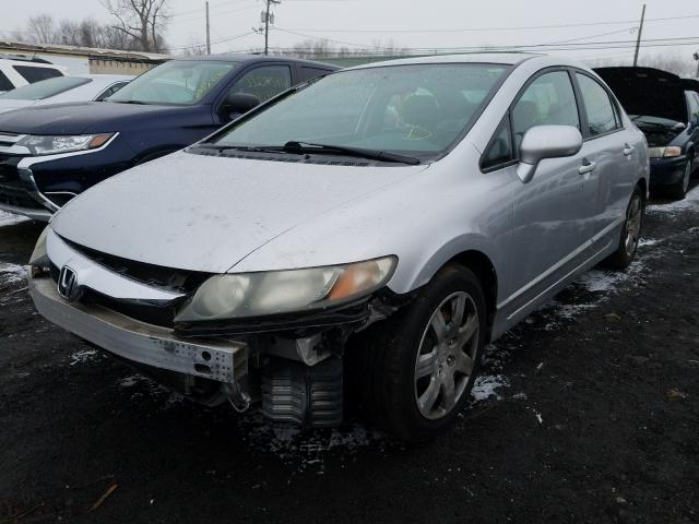 Photo 1 VIN: 19XFA1F50AE085320 - HONDA CIVIC LX 