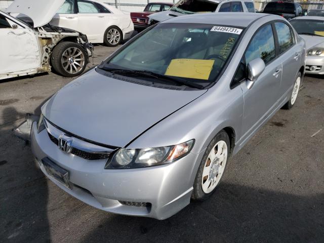 Photo 1 VIN: 19XFA1F50BE030559 - HONDA CIVIC LX 