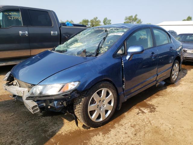 Photo 1 VIN: 19XFA1F51AE005314 - HONDA CIVIC LX 