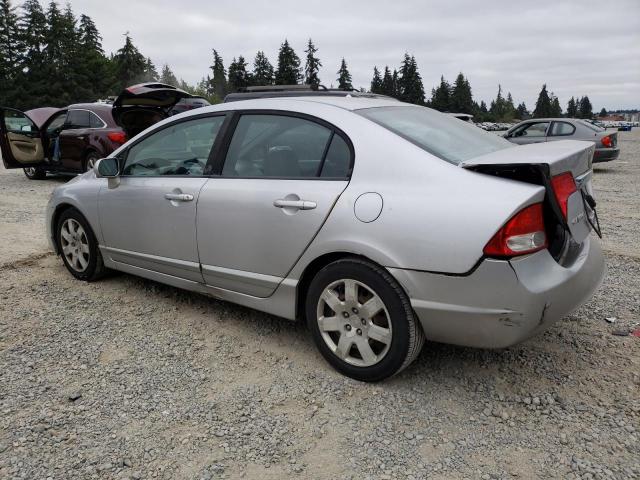 Photo 1 VIN: 19XFA1F51AE037860 - HONDA CIVIC LX 