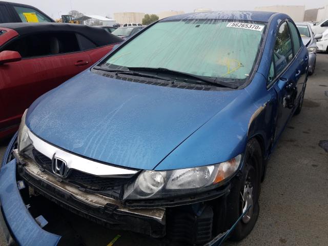 Photo 1 VIN: 19XFA1F51AE057381 - HONDA CIVIC LX 