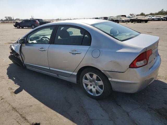 Photo 1 VIN: 19XFA1F51AE063391 - HONDA CIVIC LX 