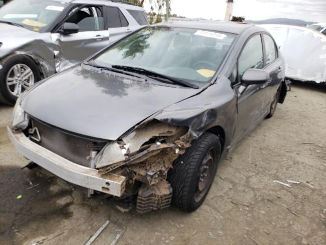 Photo 1 VIN: 19XFA1F51AE064637 - HONDA CIVIC LX 