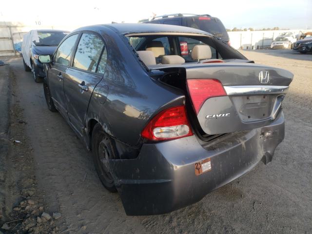 Photo 2 VIN: 19XFA1F51AE064637 - HONDA CIVIC LX 