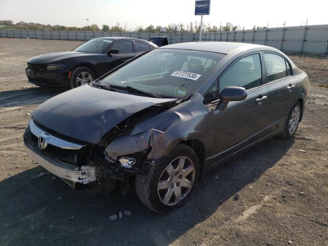 Photo 1 VIN: 19XFA1F51AE085312 - HONDA CIVIC LX 