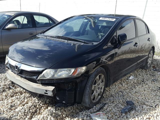 Photo 1 VIN: 19XFA1F51BE050125 - HONDA CIVIC LX 