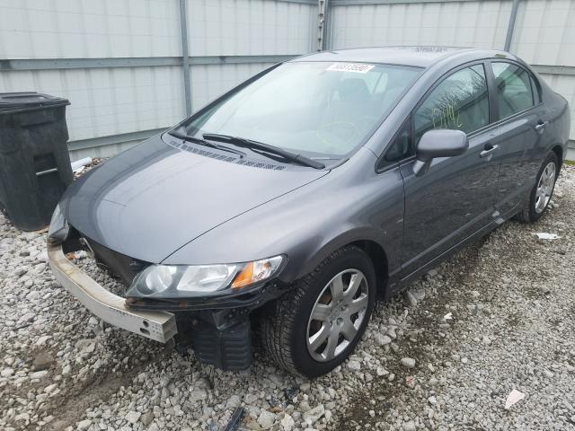 Photo 1 VIN: 19XFA1F52AE015625 - HONDA CIVIC LX 