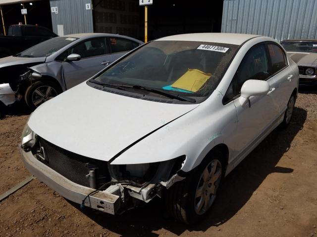 Photo 1 VIN: 19XFA1F52AE030755 - HONDA CIVIC LX 