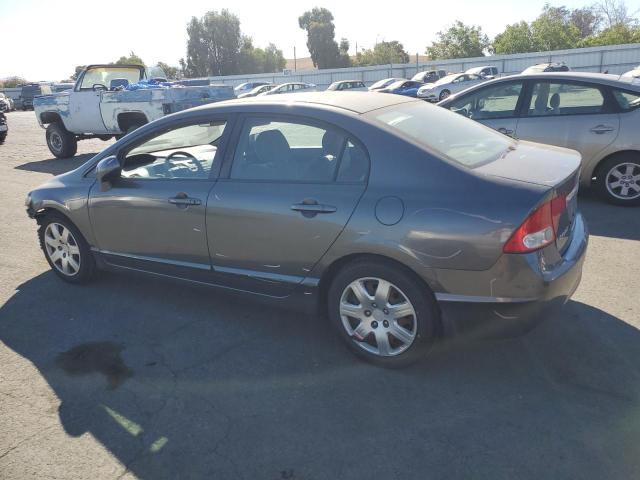 Photo 1 VIN: 19XFA1F52AE060046 - HONDA CIVIC LX 