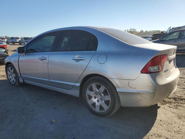 Photo 1 VIN: 19XFA1F52AE077574 - HONDA CIVIC LX 