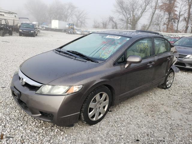 Photo 1 VIN: 19XFA1F53AE002561 - HONDA CIVIC LX 