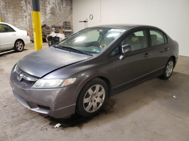 Photo 1 VIN: 19XFA1F53AE030697 - HONDA CIVIC LX 