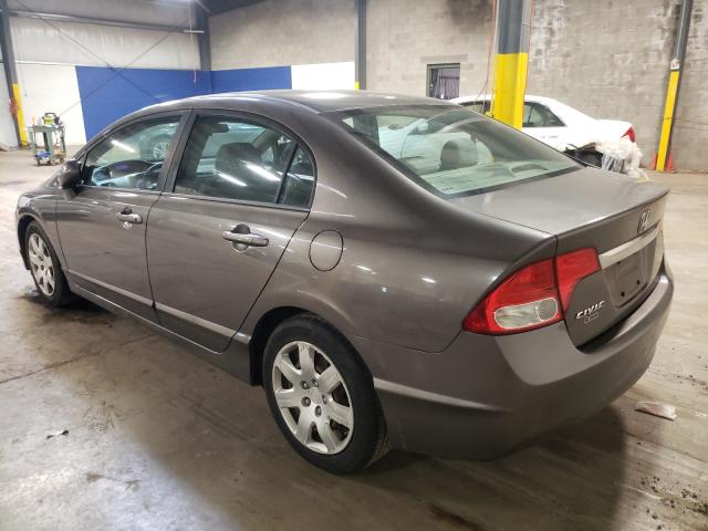 Photo 2 VIN: 19XFA1F53AE030697 - HONDA CIVIC LX 