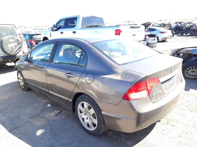 Photo 2 VIN: 19XFA1F53AE030912 - HONDA CIVIC LX 