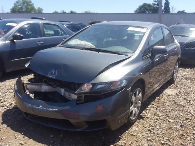 Photo 1 VIN: 19XFA1F53AE043806 - HONDA CIVIC LX 