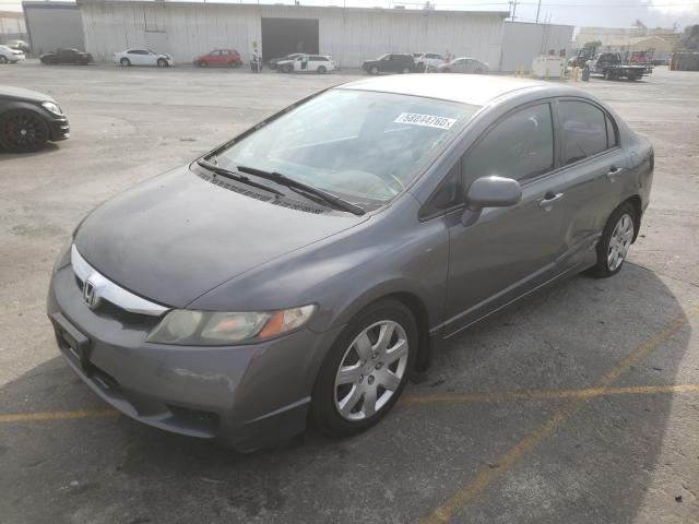 Photo 1 VIN: 19XFA1F53AE053901 - HONDA CIVIC LX 