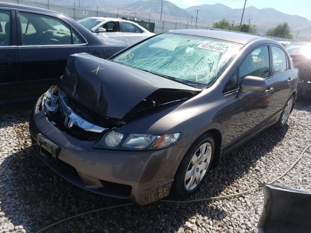 Photo 1 VIN: 19XFA1F53AE071136 - HONDA CIVIC LX 