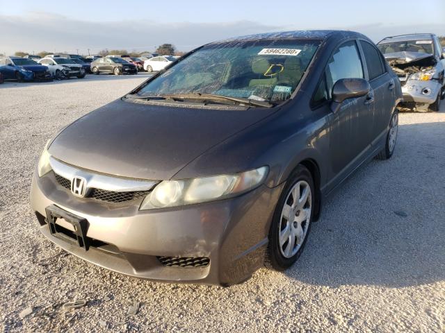 Photo 1 VIN: 19XFA1F53AE077471 - HONDA CIVIC LX 