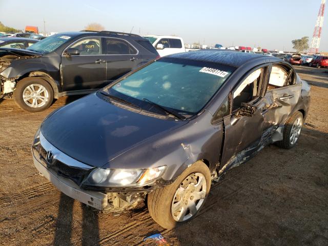 Photo 1 VIN: 19XFA1F53AE081035 - HONDA CIVIC LX 