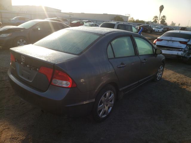 Photo 3 VIN: 19XFA1F53AE081035 - HONDA CIVIC LX 