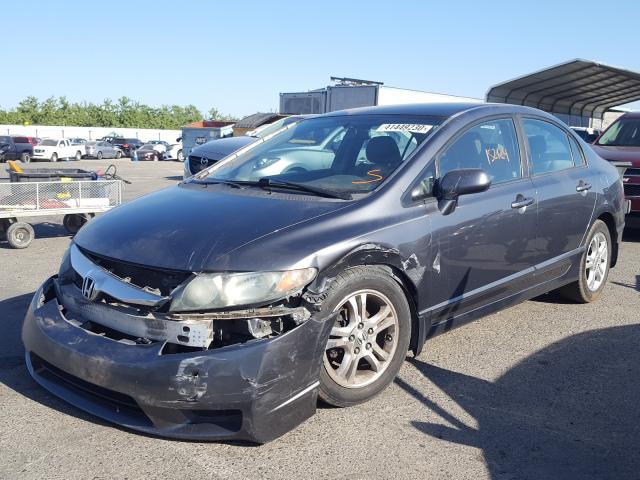 Photo 1 VIN: 19XFA1F54AE011589 - HONDA CIVIC LX 