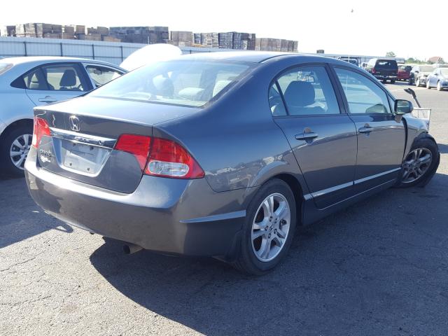 Photo 3 VIN: 19XFA1F54AE011589 - HONDA CIVIC LX 