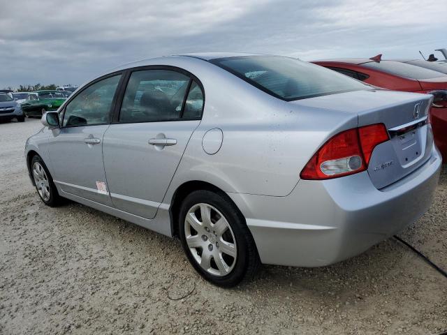 Photo 1 VIN: 19XFA1F54AE016193 - HONDA CIVIC LX 