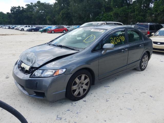 Photo 1 VIN: 19XFA1F54AE018235 - HONDA CIVIC LX 