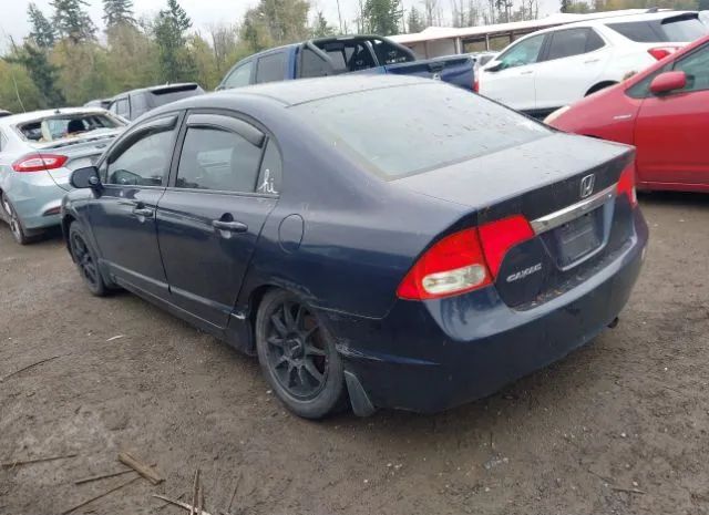 Photo 2 VIN: 19XFA1F54AE029767 - HONDA CIVIC SDN 