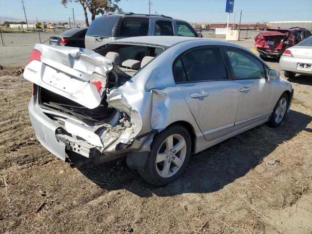 Photo 2 VIN: 19XFA1F54AE030899 - HONDA CIVIC LX 