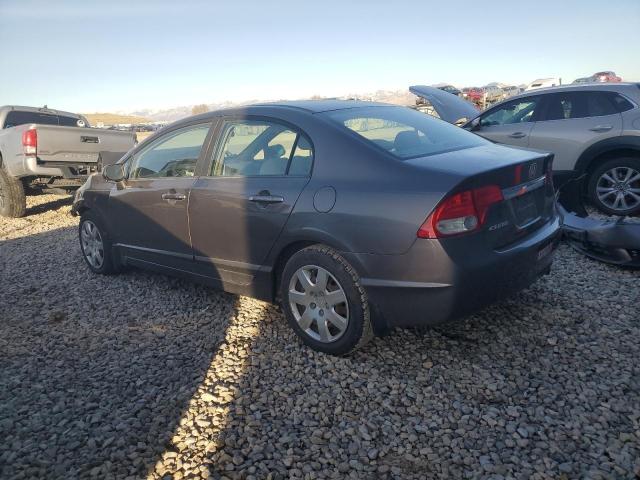 Photo 1 VIN: 19XFA1F54AE050084 - HONDA CIVIC LX 