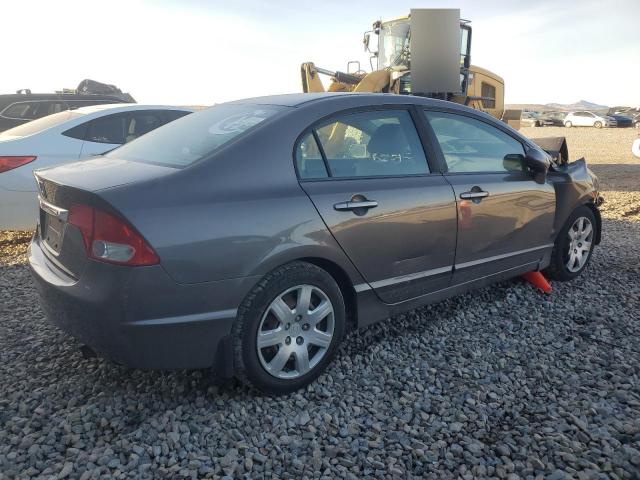 Photo 2 VIN: 19XFA1F54AE050084 - HONDA CIVIC LX 